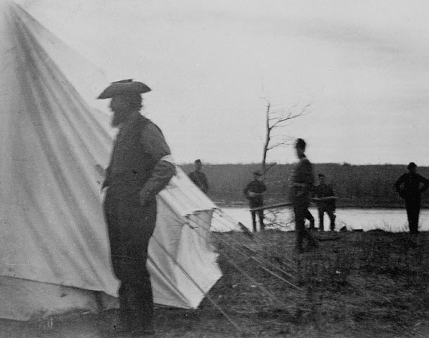 Louis Riel as a prisoner in Major-General F. D. Middleton’s camp at Batoche, 16 May 1885. James Peters / Library and Archives Canada / C-003450; MIKAN 3623590.